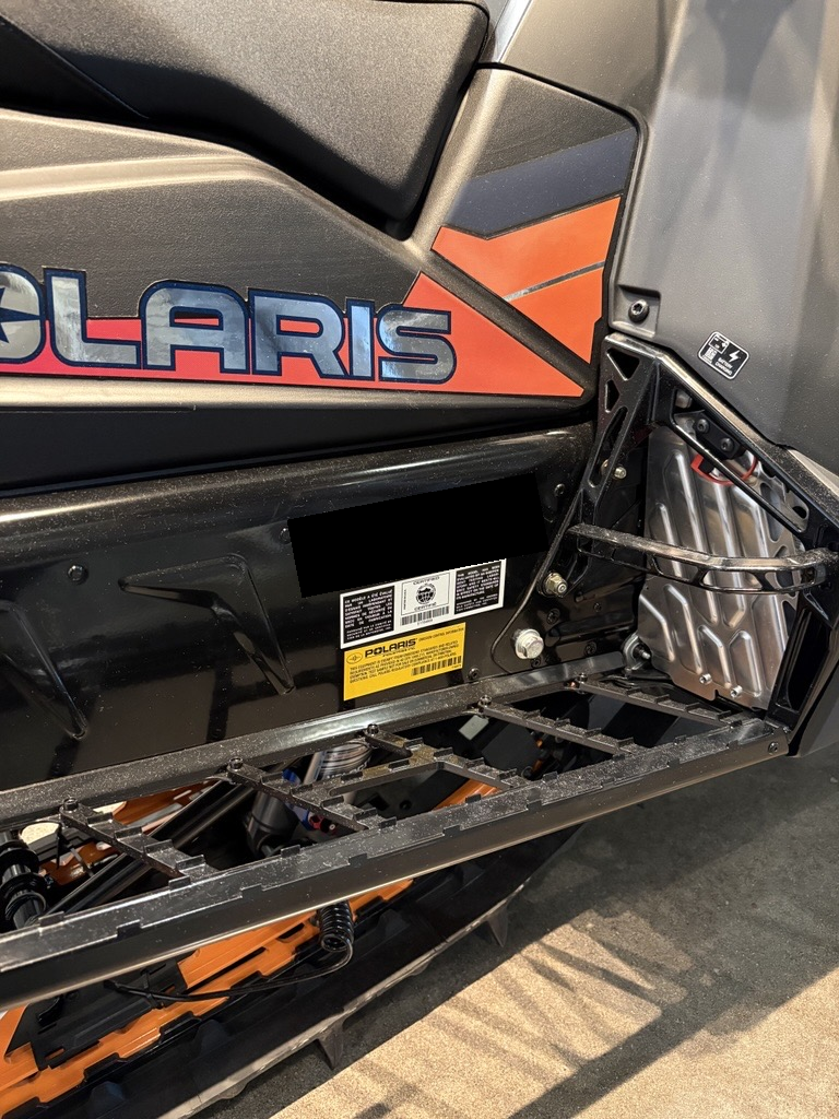 Emissions label location on a snowmobile